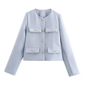 Elegant light blue short tweed-style jacket with four pockets and gold buttons for women