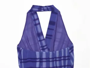 Detail of the blue printed chiffon halter neck top showing the backless design