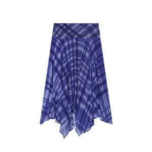Detailed view showing the blue plaid chiffon fabric and irregular handkerchief hem design.