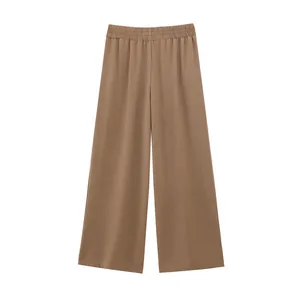 Fashionable brown wide-leg casual trousers for women with elastic waist detail on white background
