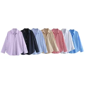 Collection of women's long-sleeve button-down shirts in various colors and stripes.
