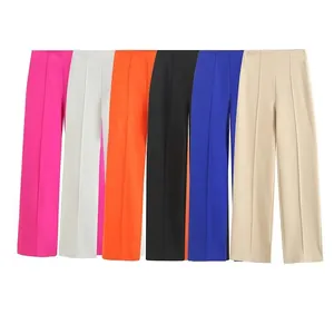 Vue détaillée de pantalons larges à taille haute dans diverses couleurs vives pour femmes