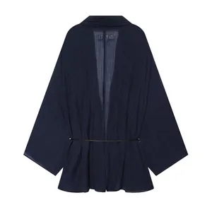 Detailed view of navy blue sheer summer coat featuring crinkled texture and waist cord