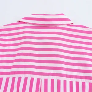 Close-up shot of the collar area on a stylish pink and white striped casual shirt for women