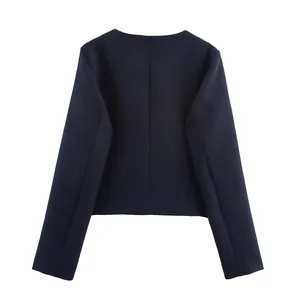 Back view of a navy blue minimalist cropped blazer jacket for women, fall collection
