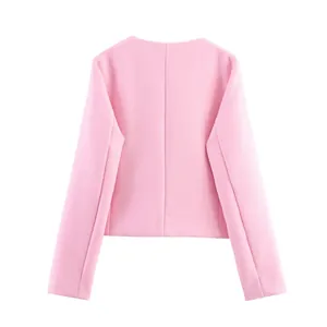 Detailed back view of a stylish baby pink cropped blazer with textured woven fabric