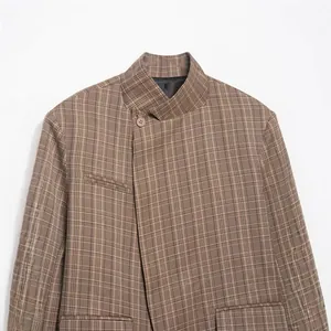 Elegant women's brown plaid blazer jacket featuring a stand collar and unique button detail
