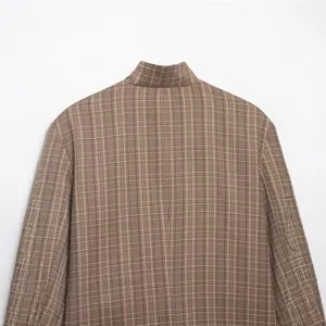 Elegant brown plaid blazer for women featuring a classic checkered pattern and tailored fit