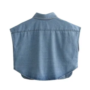 Back view of light blue denim short vest with stylish yoke and curved hem detail.