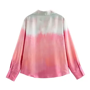 Back view of pink tie-dye satin shirt featuring a vibrant gradient print and button cuffs.