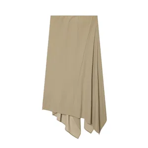Elegant minimalist beige asymmetric midi skirt featuring a draped irregular hemline.