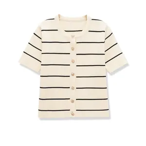 Detail view of the striped knit cardigan with premium gold buttons and round neck.