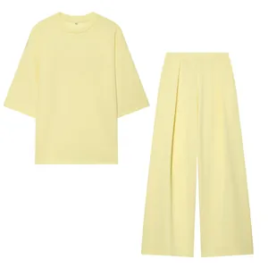 Top Casual a Manica Corta in Tinta Unita da Donna con Spacco Laterale Pantaloni Plissettati a Gamba Larga a Vita Alta in Poliestere