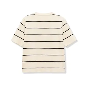 Back view of a cream short sleeve knit sweater with classic black horizontal stripes.