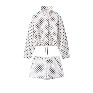 Stylish white polka dot seersucker two-piece set with cropped jacket and shorts