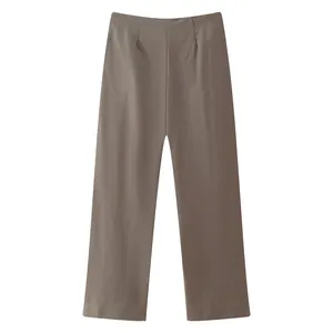 Vista dettagliata dei pantaloni a gamba larga color talpa a vita alta da donna, estate 2024