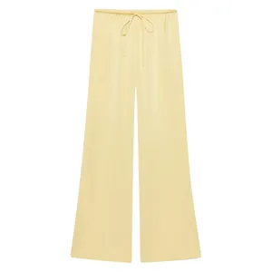 Elegant light yellow satin wide-leg trousers featuring an adjustable drawstring waist