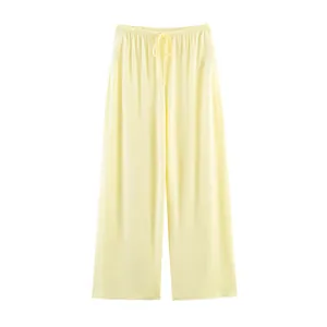 Comodi pantaloni lounge a gamba larga giallo chiaro a vita alta con coulisse regolabile.
