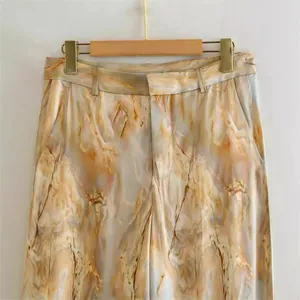 High-waisted straight-leg trousers with elegant marble tie-dye print in silky satin
