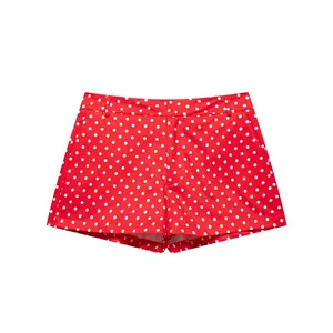 Stylish casual women's red seersucker shorts with white polka dots for a summer look
