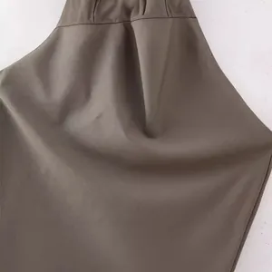 Elegante top a lupetto senza schiena da donna estate 2024 in taupe con trama di tessuto
