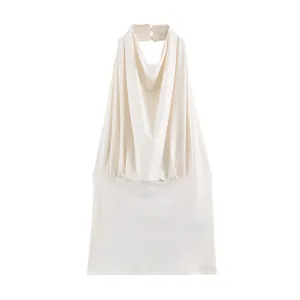 Elegant cream-colored pleated halter top with a stylish draped neck design for summer