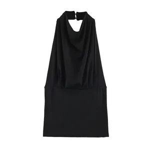 Close-up of black sleeveless halter top with elegant draped pleated neckline detail.