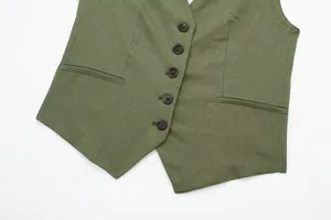 Detailed macro view of an olive green linen blend waistcoat featuring dark buttons.