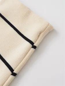 Close-up detail of striped knit fabric showing texture and pattern