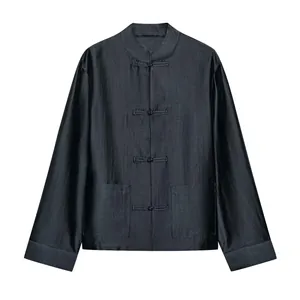 Front view of a black loose casual shirt for women featuring traditional knot buttons