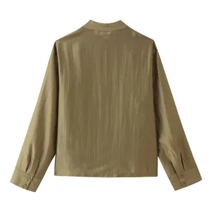Detailed back view of a glossy olive green long-sleeved blouse with button cuffs.