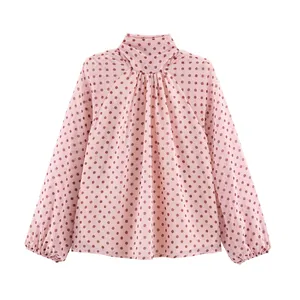 Elegant long-sleeved polka dot print blouse for women in a stylish loose fit design