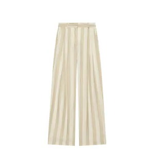 Vue détaillée macro du pantalon large à rayures verticales et taille haute beige