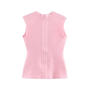 Back view of a pink sleeveless knitted vest showing the central zipper and ribbed texture