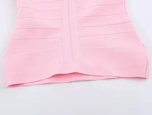 Macro view of high-elastic pink ribbed bandage knit texture on a slim-fit tank top