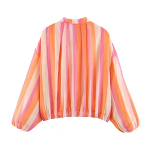 Back view of a vibrant pink and orange vertical striped loose-fitting lady's casual jacket