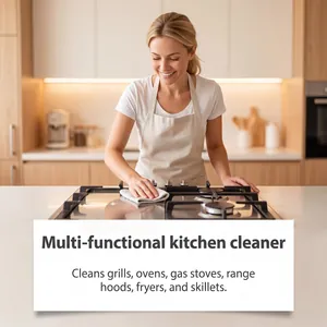 A professional woman cleaning a modern gas stove with multi-functional kitchen cleaner spray