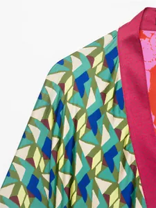 Close-up of elegant geometric and floral print fabric for women fashion jacket
