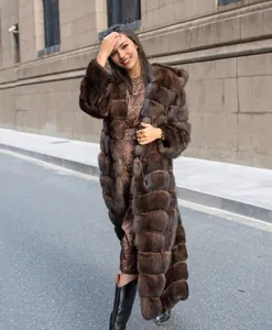 Elegant long hooded faux mink fur coat for women in rich chocolate brown, winter wear.