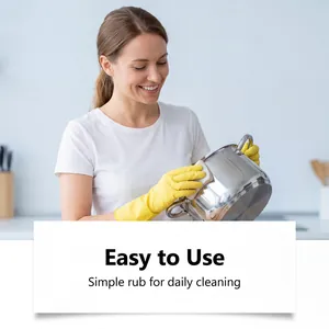 Kitchen cleaning paste being applied to a stainless steel pot for easy daily use