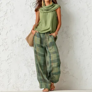 Damen Vintage Set mit grünem ärmellosem Oberteil und karierter Hose in Übergröße