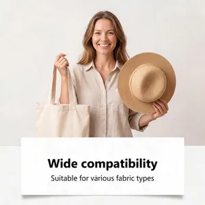 Smiling woman holding a straw hat and canvas tote bag for fabric styling spray.