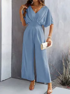 Elegant light blue short sleeve wide-leg jumpsuit with V-neck and stylish high waist design