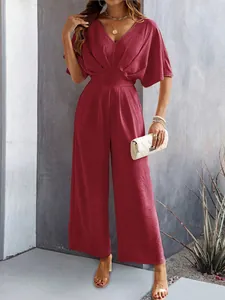Elegant burgundy wide-leg jumpsuit with deep V-neck and fluttering short sleeves design