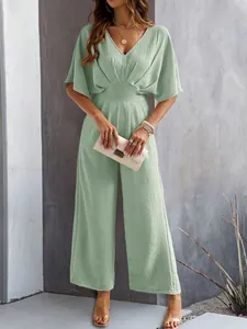 Stylish light green wide-leg jumpsuit featuring a V-neck and short flutter sleeves.