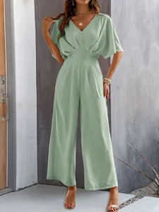 Detailed front view of an elegant sage green v-neck short sleeve wide-leg jumpsuit for women