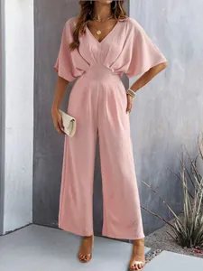 Full view of elegant pink V-neck short sleeve wide-leg jumpsuit for women