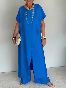 Elegante set due pezzi blu elettrico con tunica asimmetrica e pantaloni a gamba larga