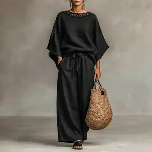 Elegantes schwarzes Zweiteiler-Set aus Baumwolle und Leinen mit Spitzenkragen für den Sommer.
