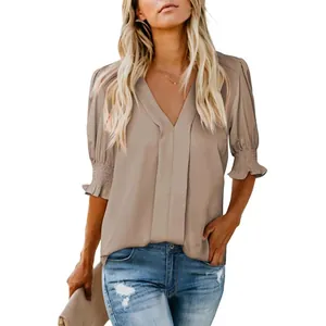 Stylish women's khaki V-neck summer blouse with puffed short sleeves and loose fit design